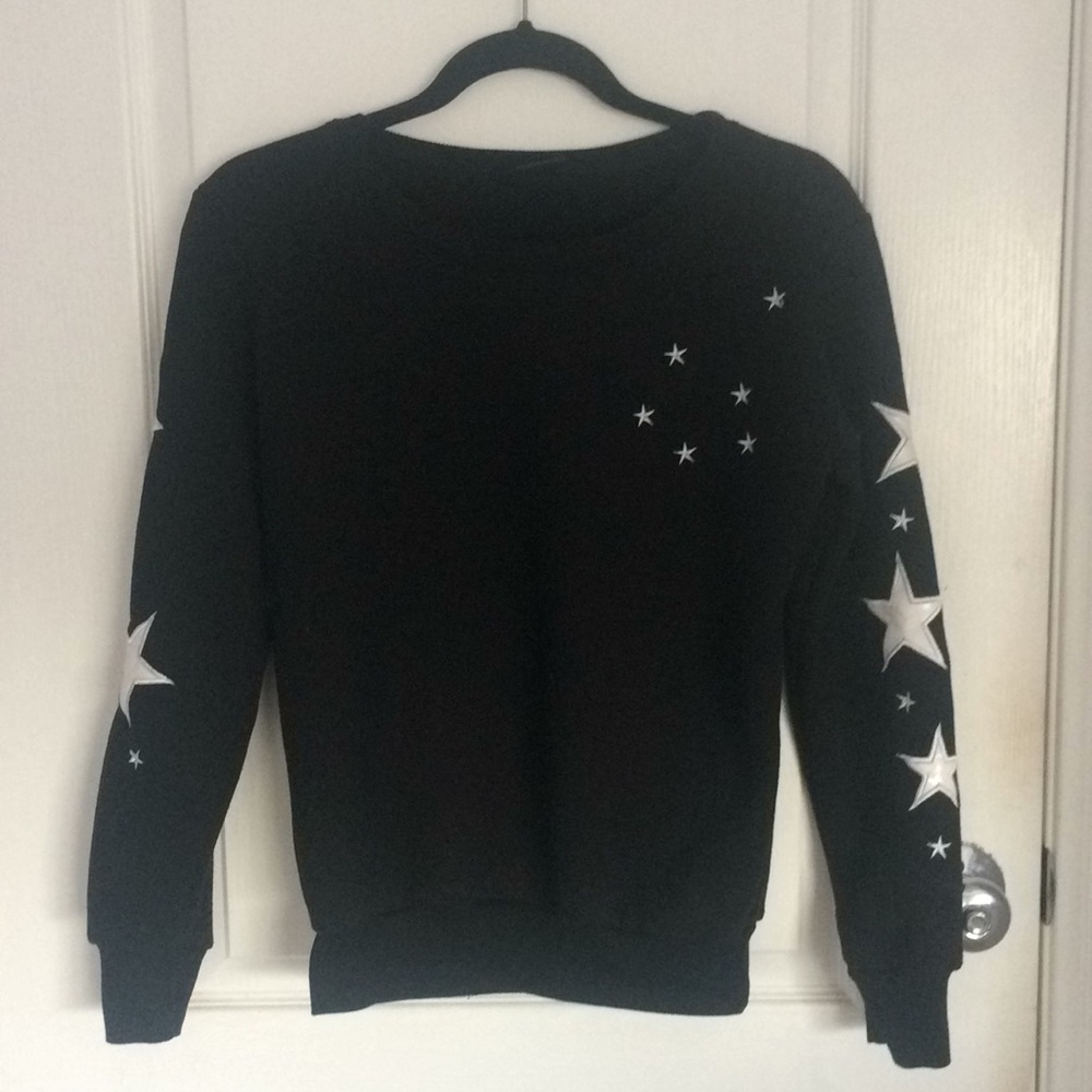 black sweatshirt with white stars